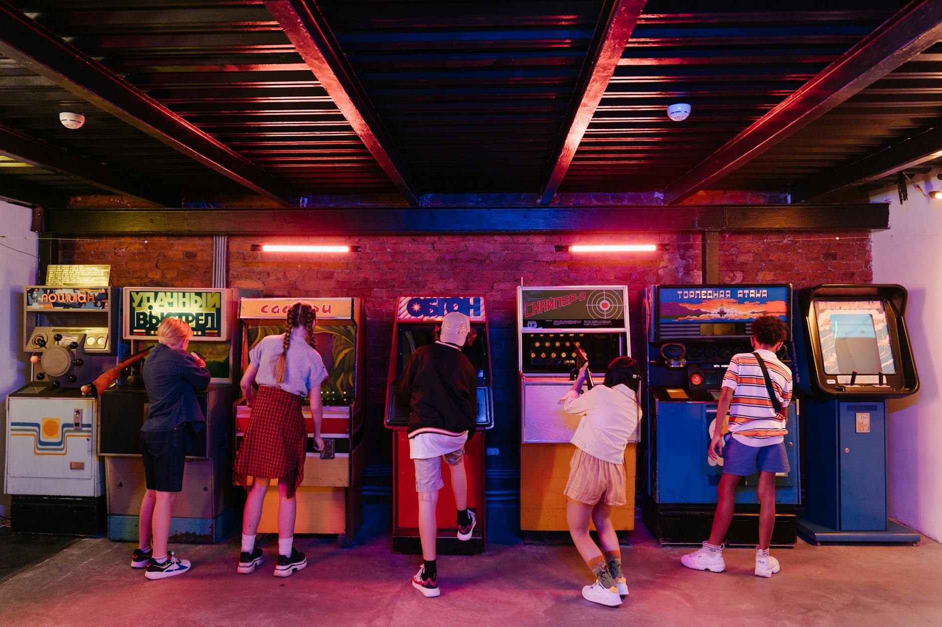 people standing in front of store during night time